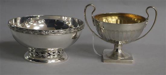 A George V demi fluted two handled pedestal sugar bowl, Mappin & Webb, London, 1913 and a later silver sugar bowl, 13 oz.